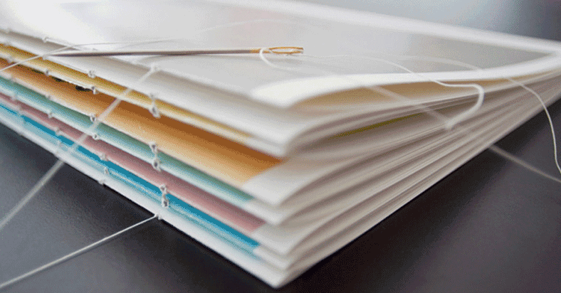 頁(yè)數(shù)較多的企業(yè)畫冊(cè)印刷品適用鎖線膠裝  第1張